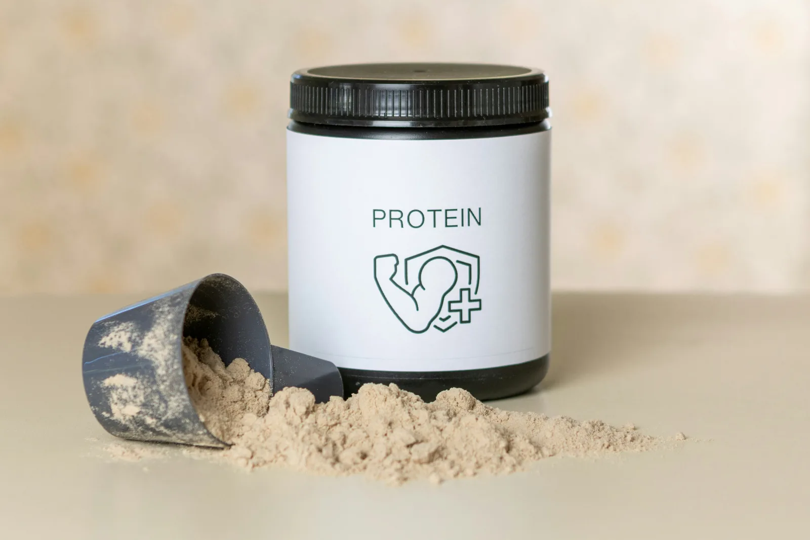 How plant protein closes the gap: a jar of protein powder next to a scoop of powder
