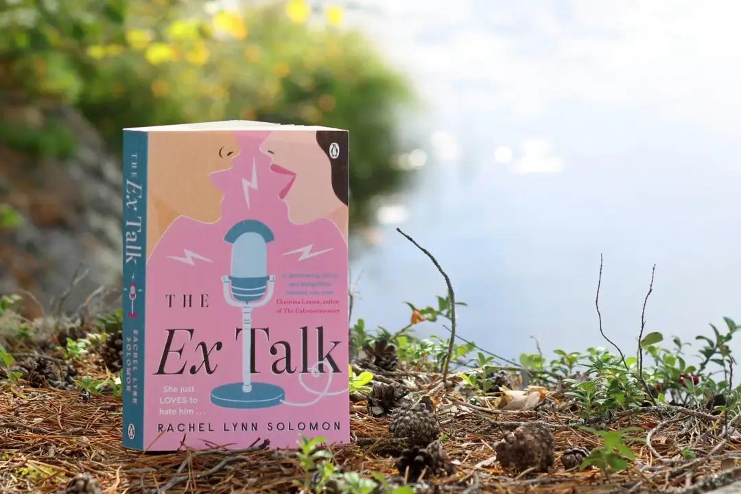The Lally 2010 study: a book sitting on the ground next to a body of water