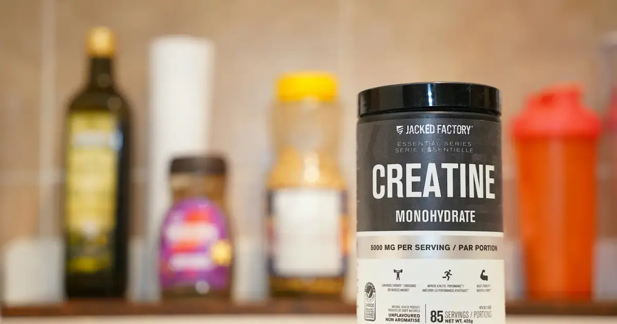 Creatine monohydrate from Jacked Factory displayed on a kitchen counter.