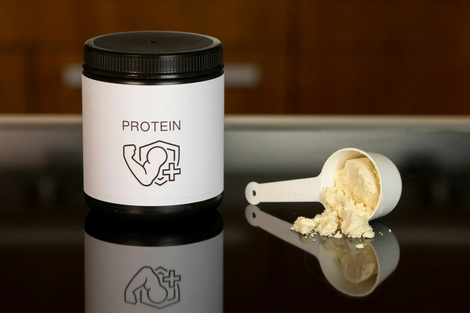 Protein powder is fine: a container of protein powder next to a spoon