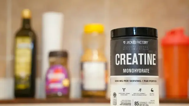 Creatine monohydrate from Jacked Factory displayed on a kitchen counter.