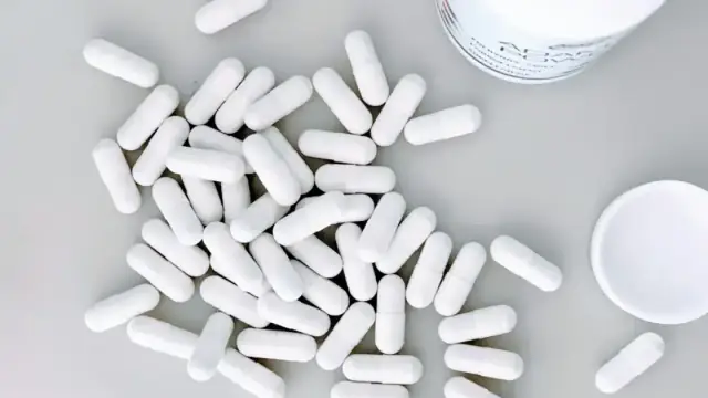 white medication capsules